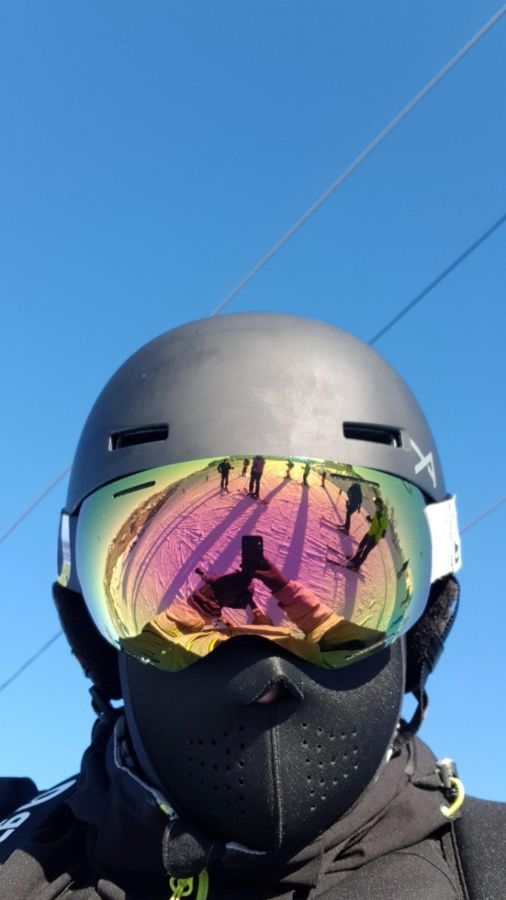 Face hidden by goggles and a balaclava