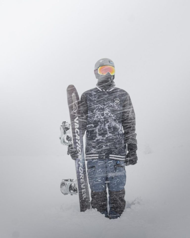 Figure standing in a whiteout