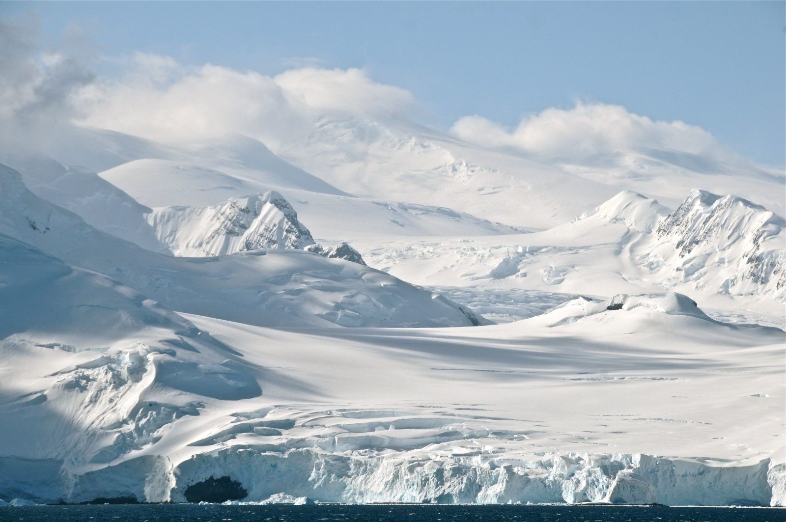 Glaciers and snowfields under cloud