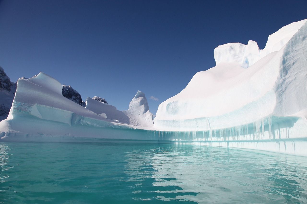 Turquoise meltwater at an ice wall