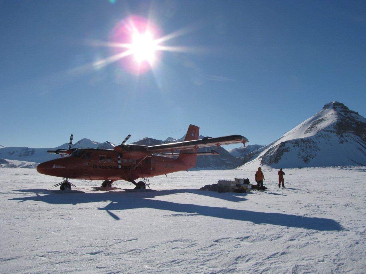 Ski plane under a bright sun on the ice