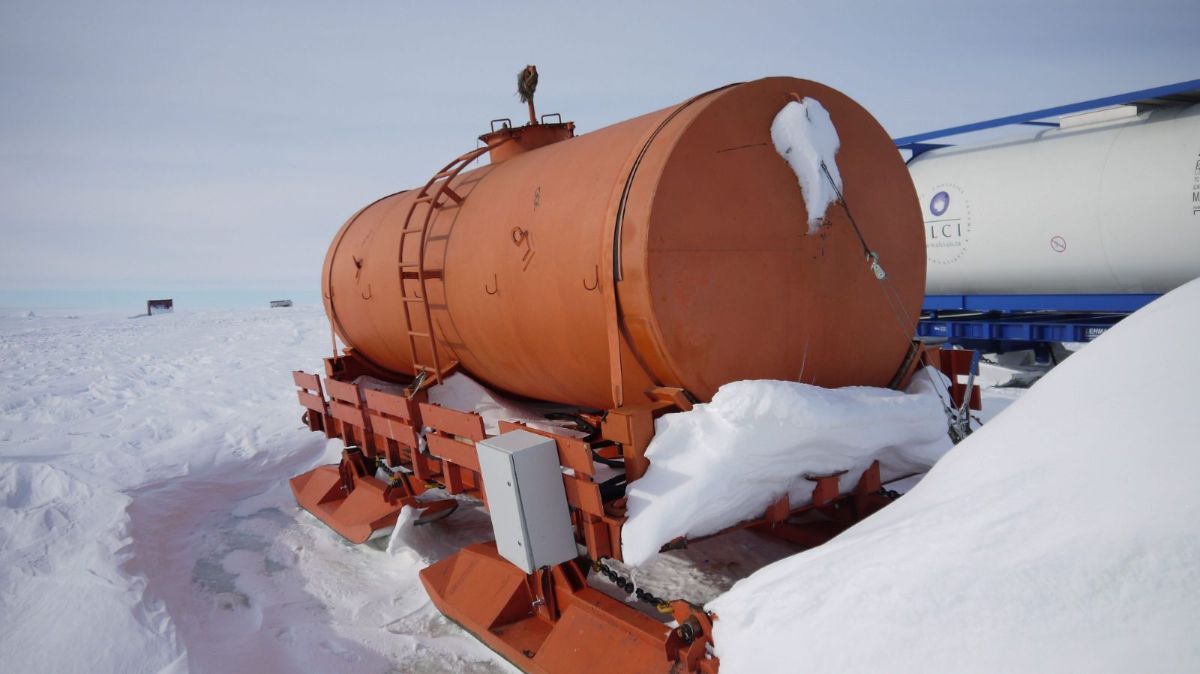 Snow-covered fuel tank on a sled