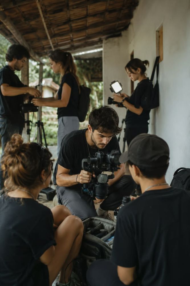 Crew checking a monitor on location