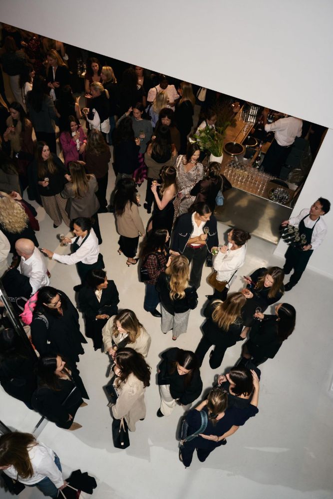 Crowd seen from above on a white staircase
