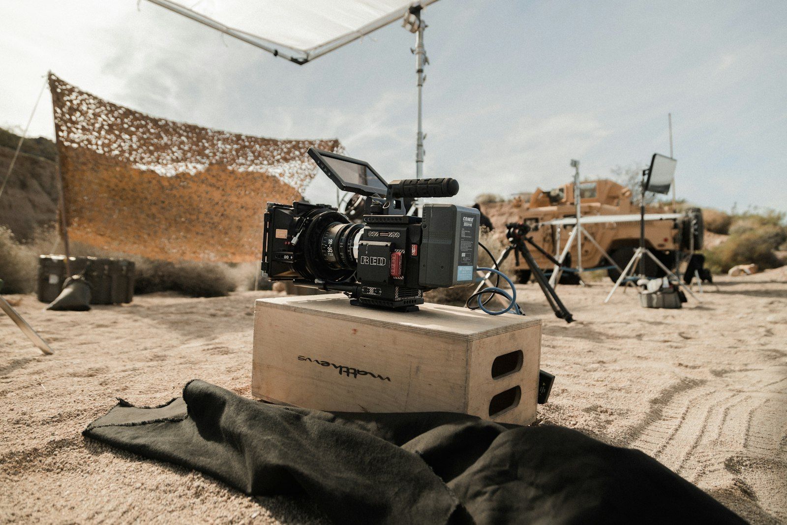 Cinema camera on an apple box on a sand set