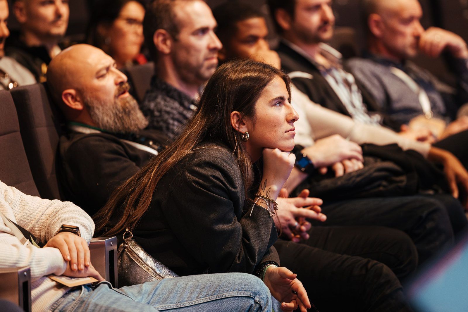 Audience listening at a conference talk