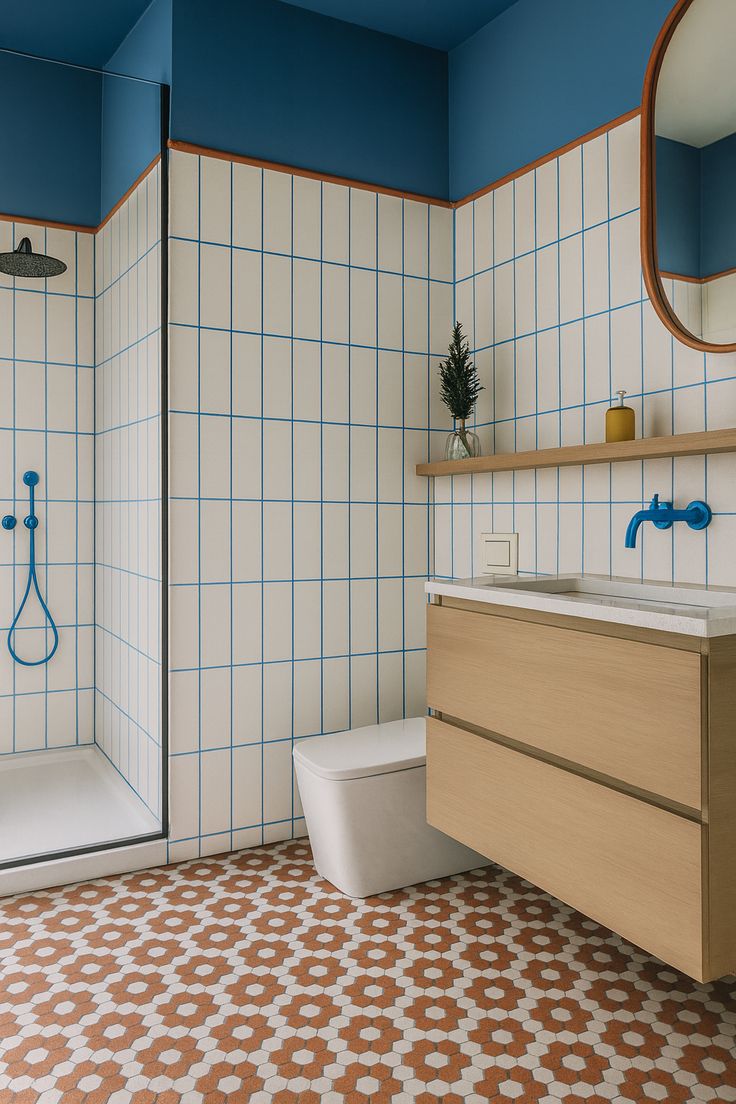 Tiled shower room with blue ceiling and patterned floor