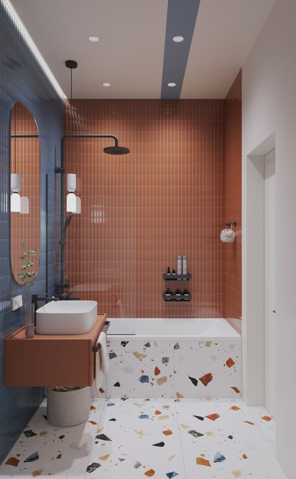 Terracotta tiled bathroom with terrazzo tub