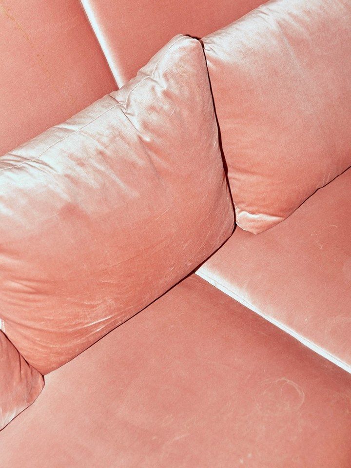 Close view of pink velvet cushions