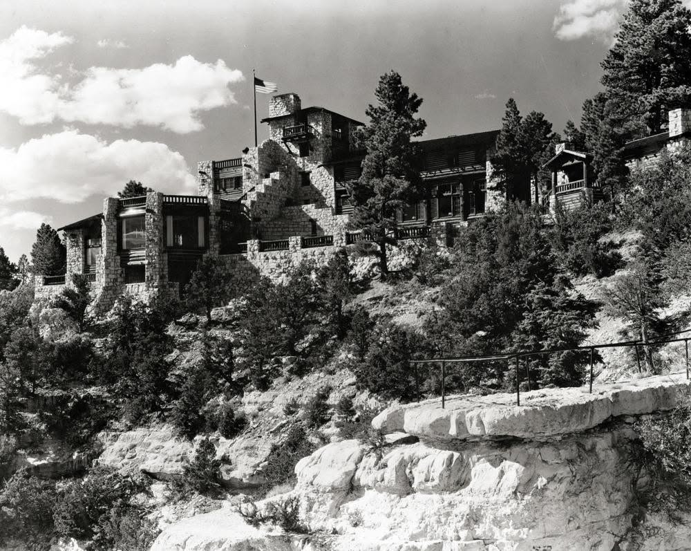 Stone lodge among pines on the canyon edge
