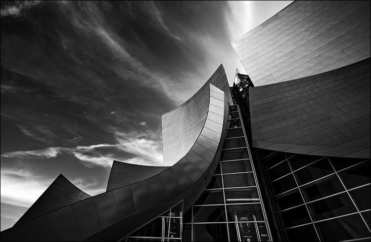 Walt Disney Concert Hall, steel sails against clouds