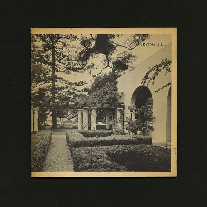 Printed photograph of an arcade and garden