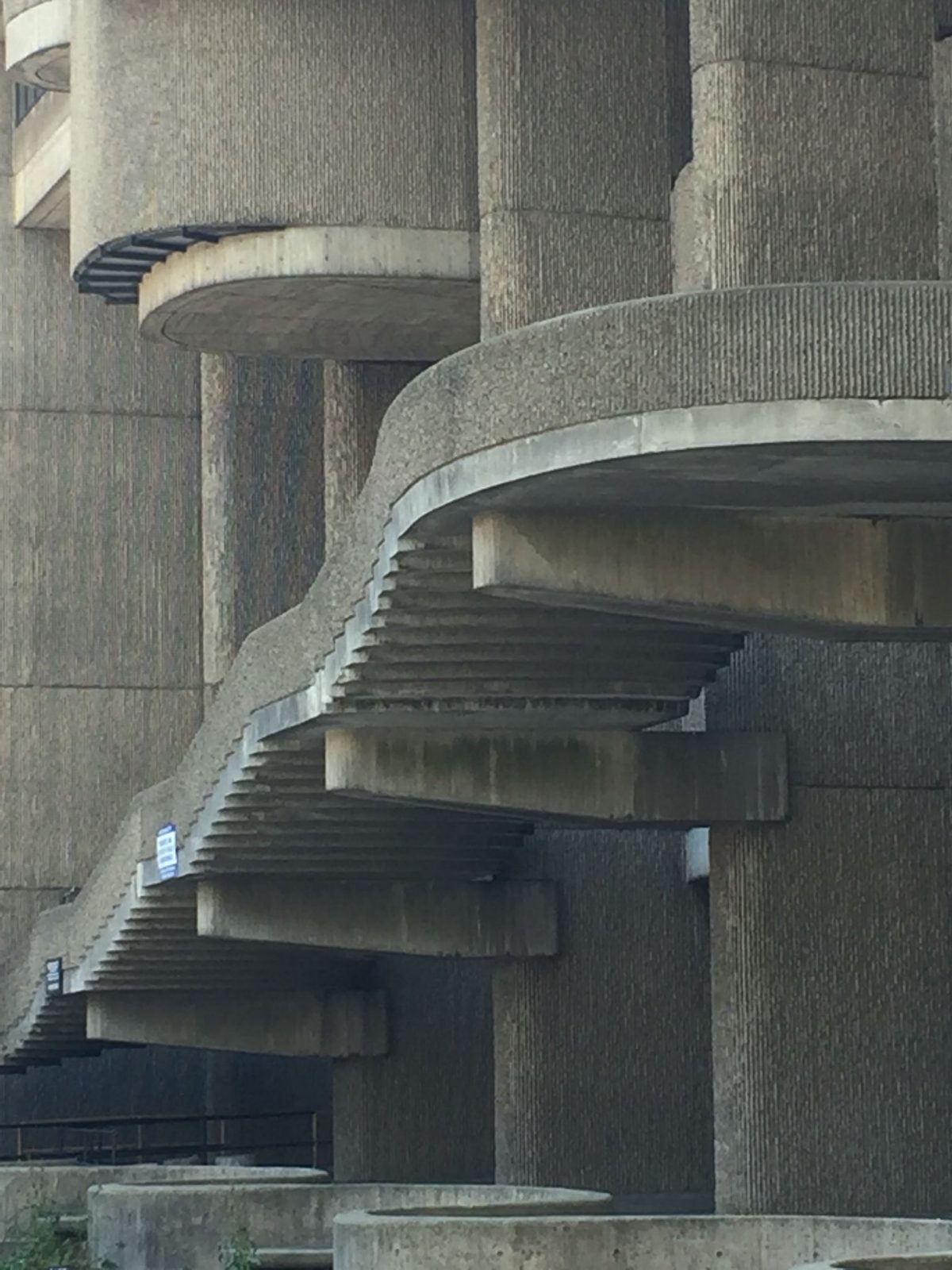 Curved concrete stair on round piers