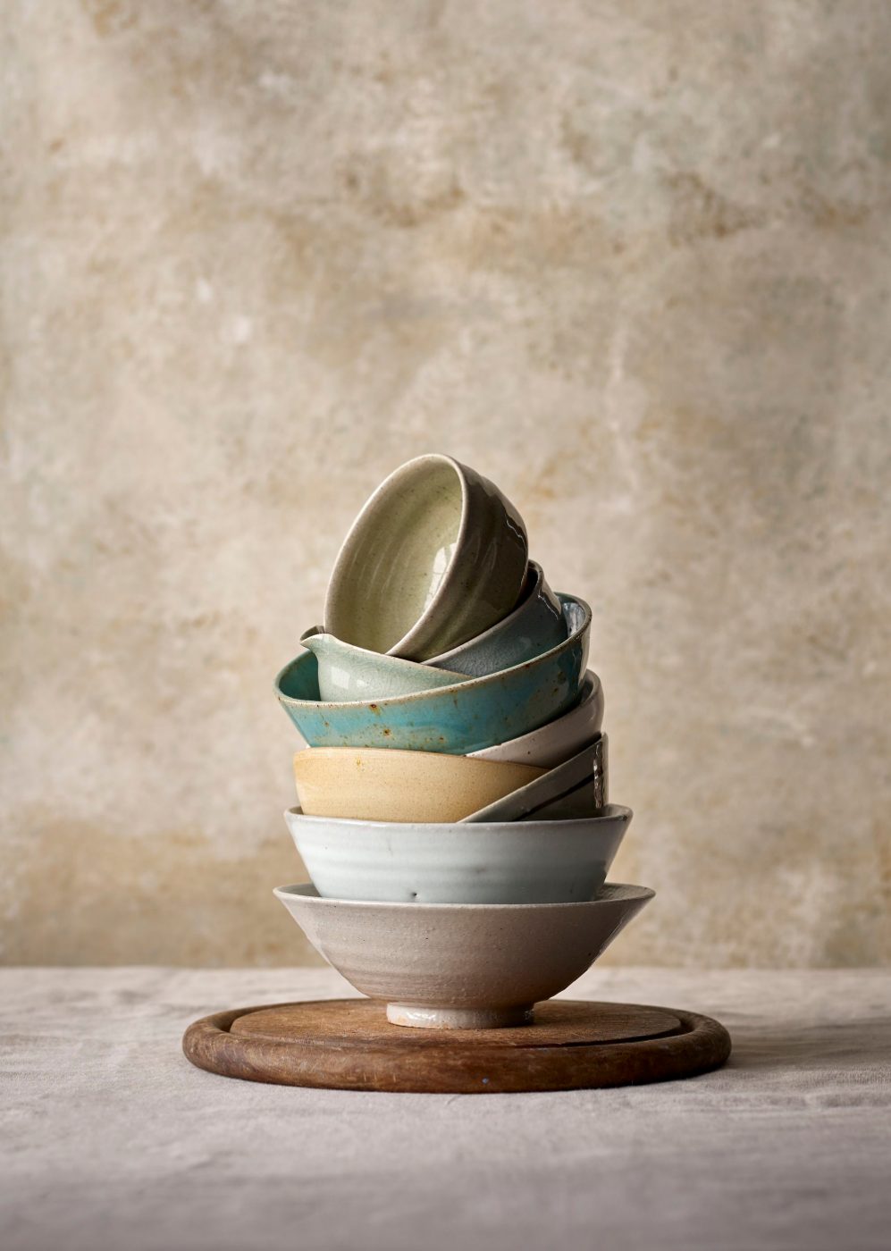 Stack of bowls in five glazes