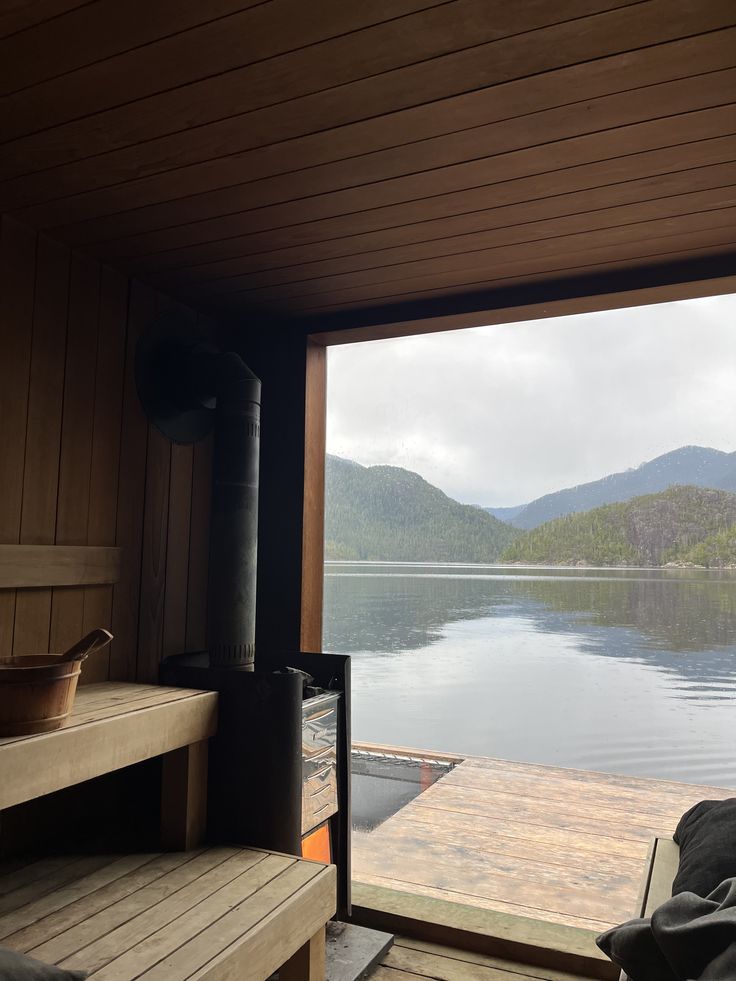 Stove room window open onto the lake and hills