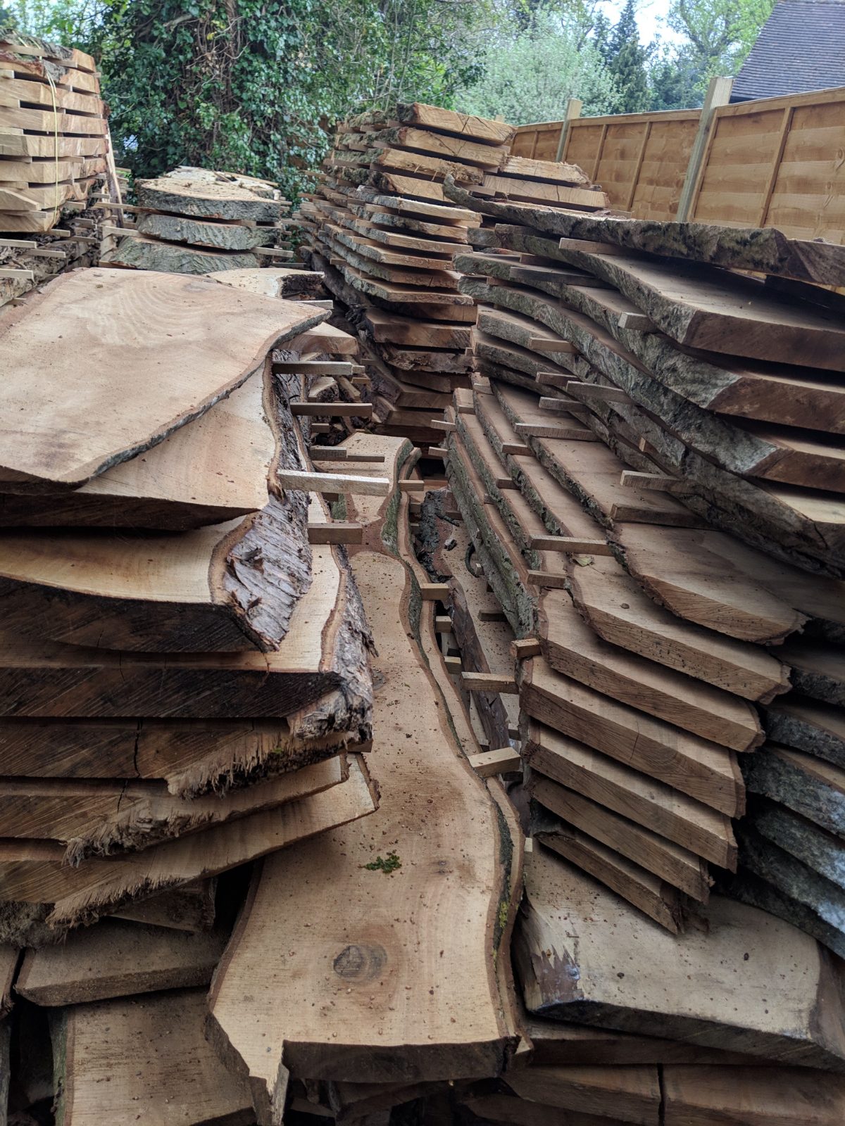 Boards air drying in a stack with spacer sticks between layers