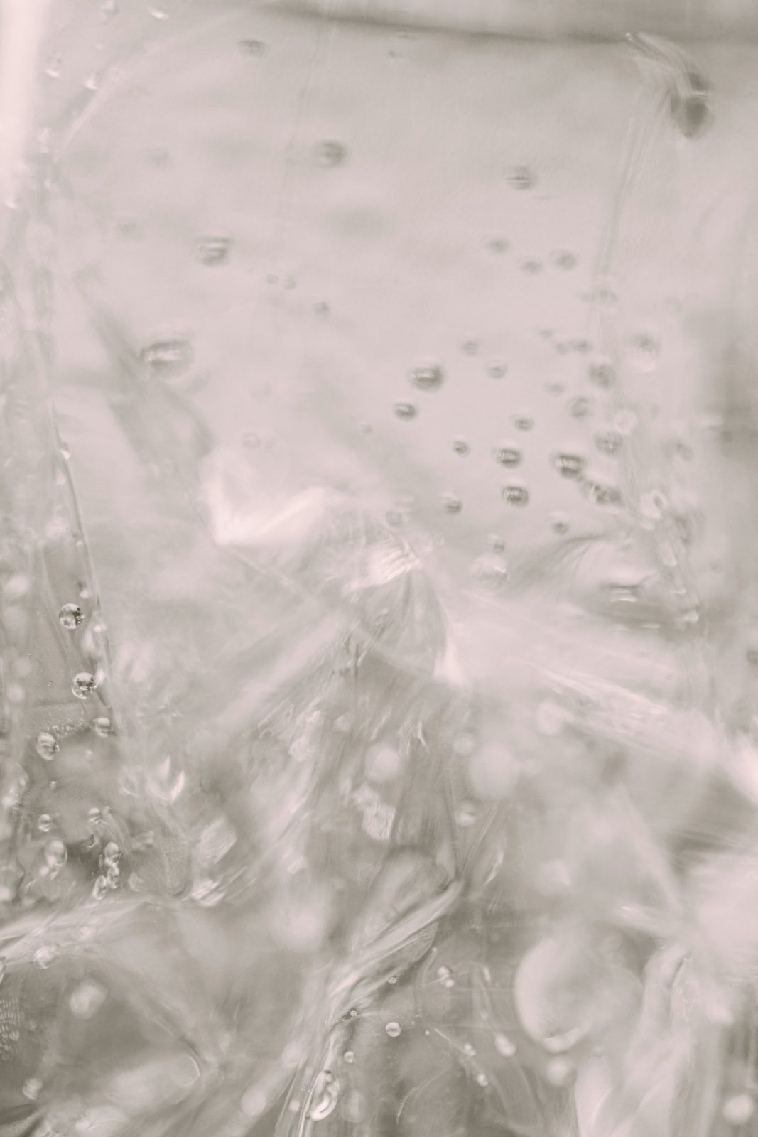 Water drop on a grey surface