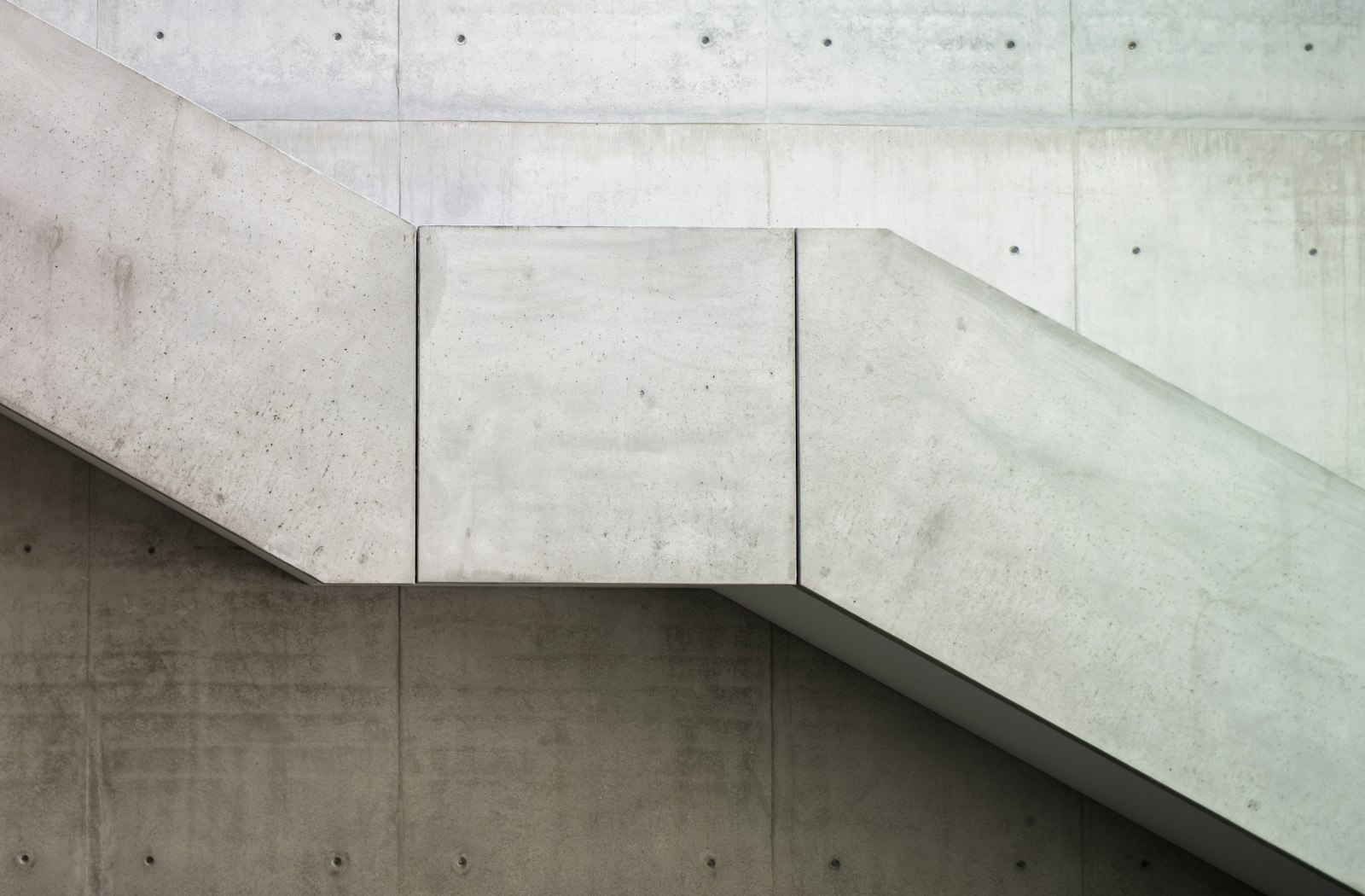 Concrete stair against a board-formed wall