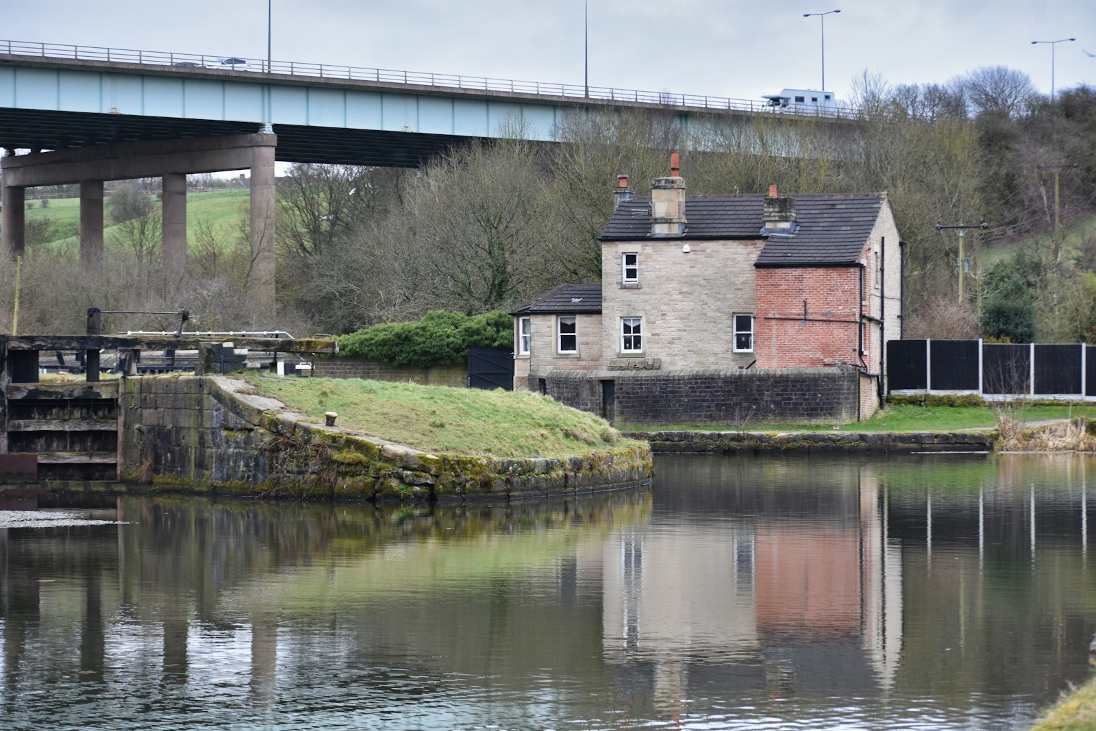 A lock cottage beside the tail of a lock