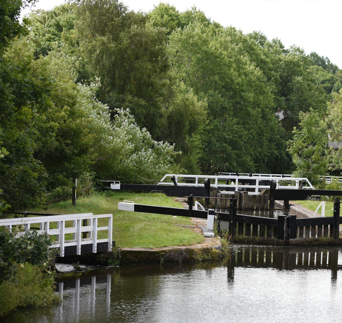 Bottom gates and a white footbridge