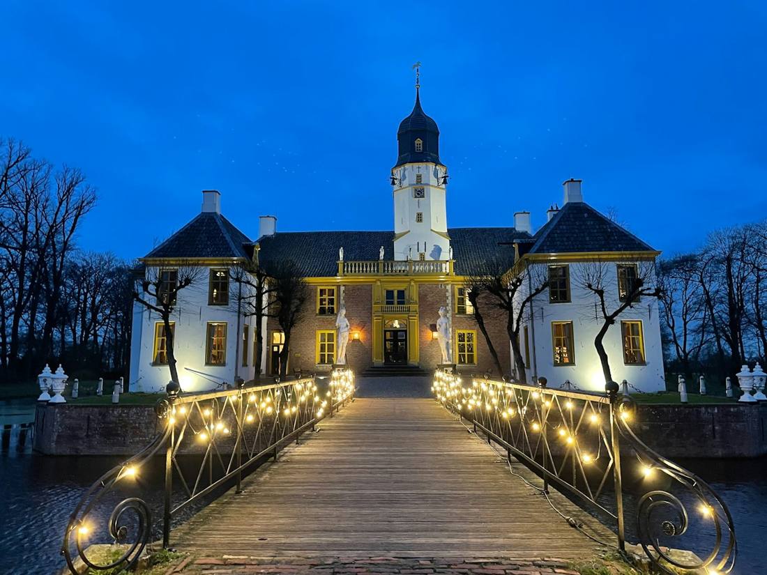Manor house lit at dusk